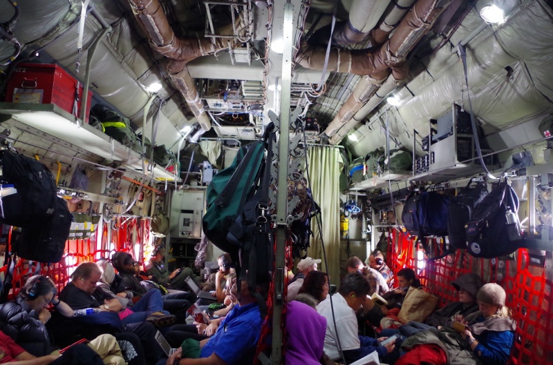 Passengers on board the C-130. © Mia Bennett, August 2014.