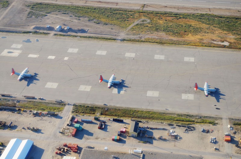 Three U.S. ANG C-130s on the runway in Kangerlussuaq. © Mia Bennett, August 2014.