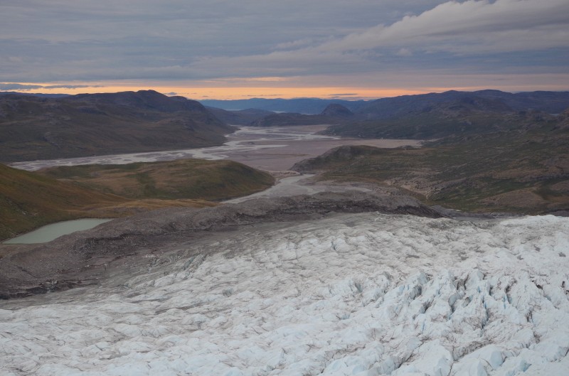 The view above the crevasse fields at the edge of the Russell Glacier above Kangerlussuaq, Greenland. © Mia Bennett, August 2014.