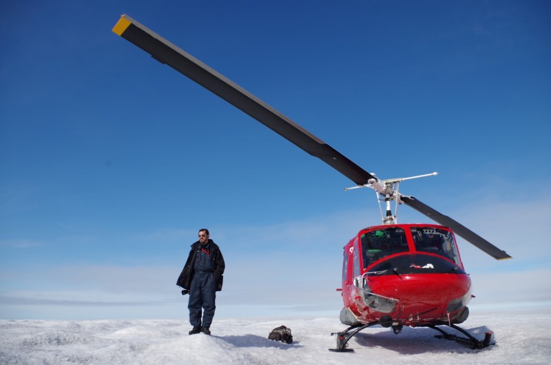 Our helicopter pilot, employed by Air Greenland, on top of the Greenland Ice Sheet. August 2014.