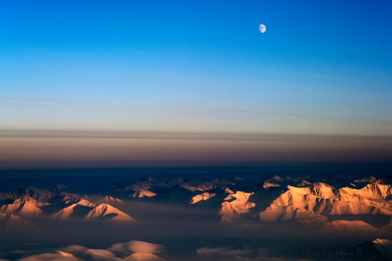 The moon over northeast Greenland. Photo: Michael Studinger/NASA Earth Observatory