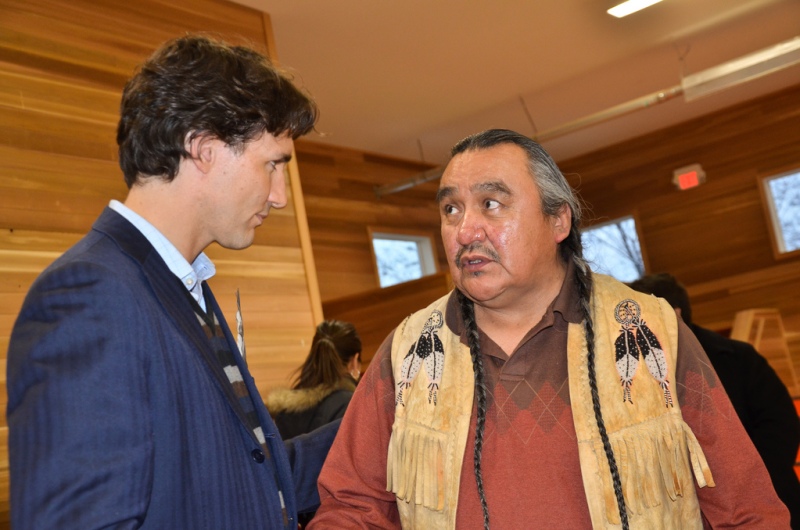Justin Trudeau speaking with Chief Mike Archie of the Canim Lake Band, a First Nations group from British Columbia, in 2013. Flickr/Photo: Carl Archie, used under Creative Commons license.